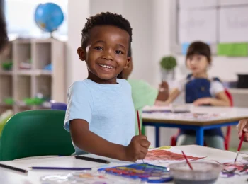 classroom-portrait-of-smiling-male-elementary-scho-2024-10-21-15-46-17-utc classroom-portrait-of-smiling-male-elementary-scho-2024-10-21-15-46-17-utc